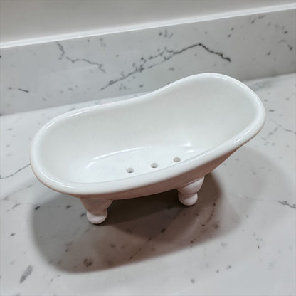 White ceramic bathtub soap holder